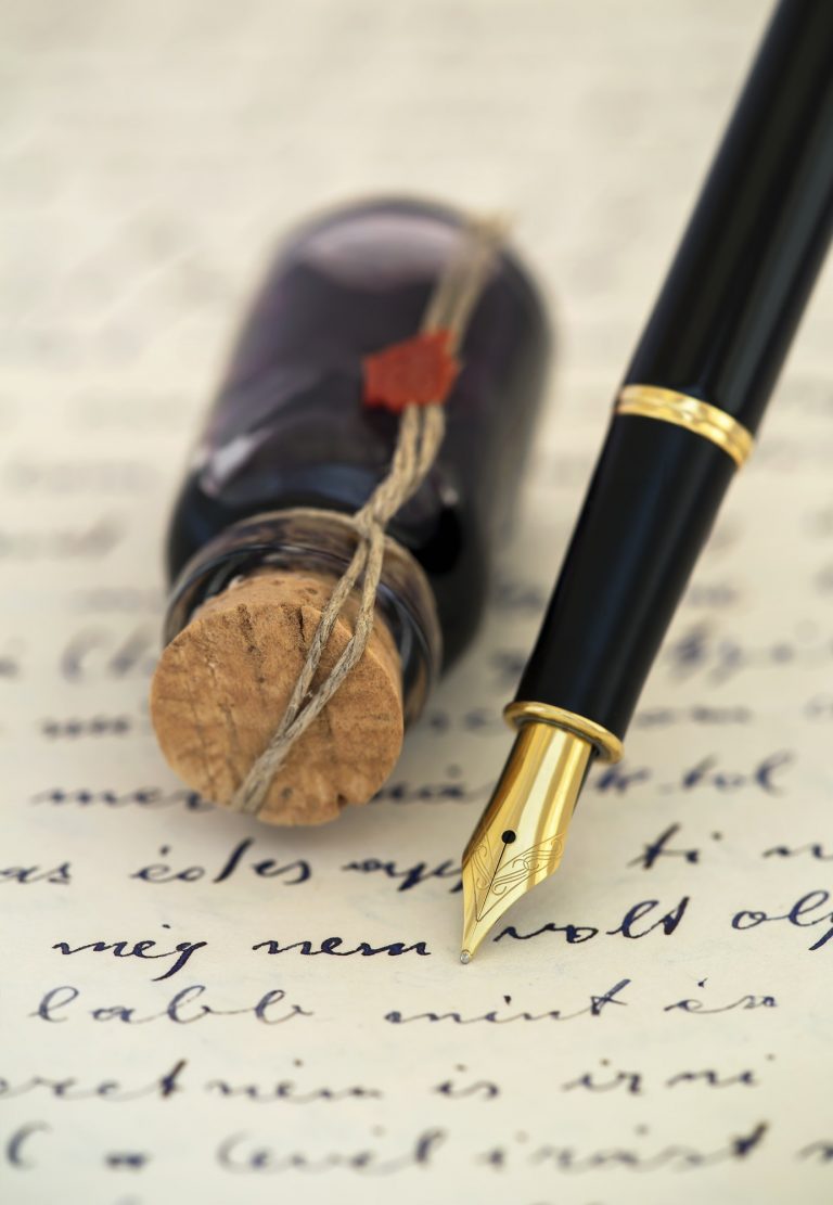 Fountain pen on a handwritten letter